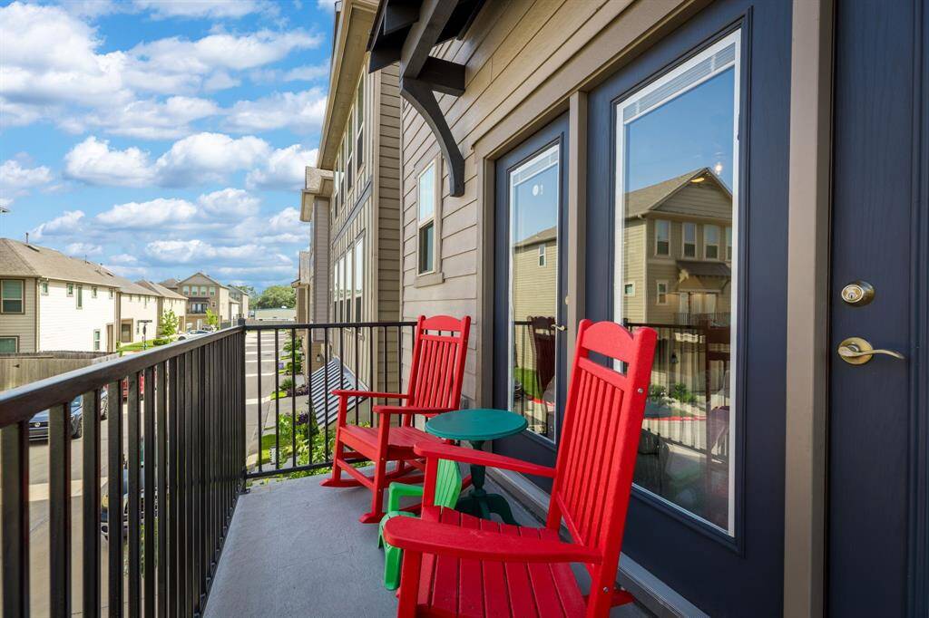 Front balcony just off the living area.  East facing enjoy cool evenings and beautiful sunrises!    One of 3 outdoor living spaces !