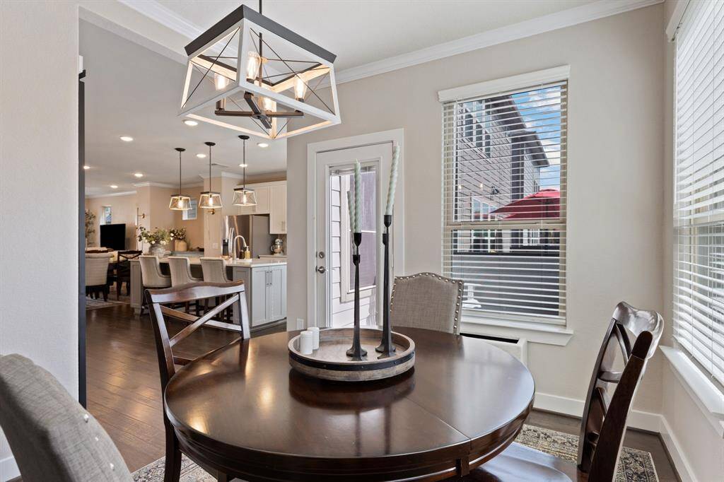 View from breakfast to kitchen.  Home has a tankless water heater installed in 2024.