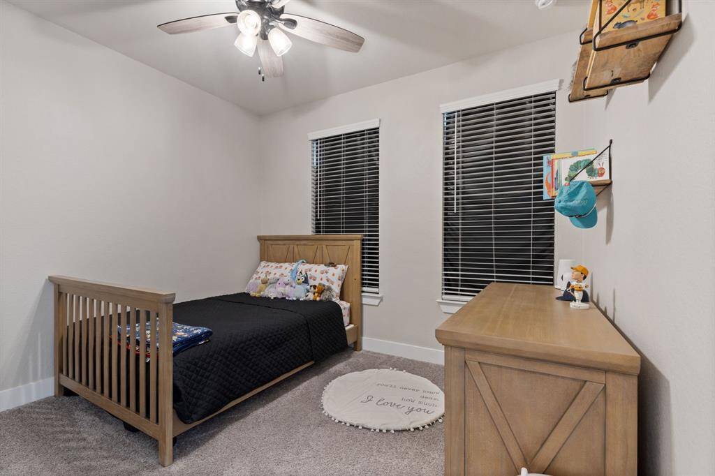 One of 3 big secondary bedrooms.     Plenty of room for a home office plus a home gym.