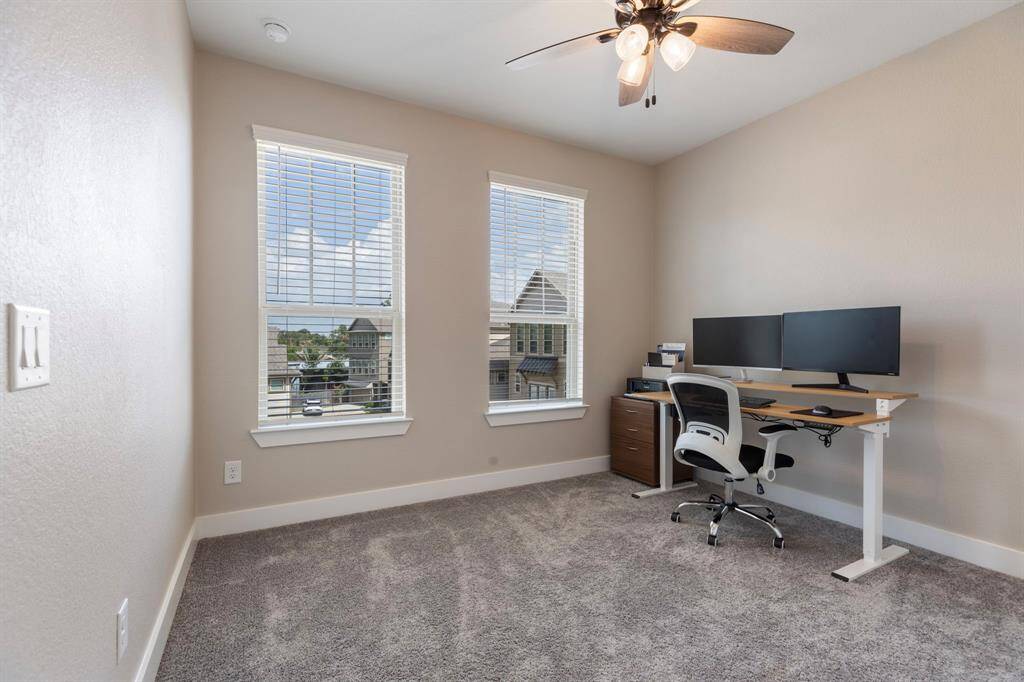 Another of the bedrooms up stairs.  Perfect for a home office.  New carpet installed August 2024