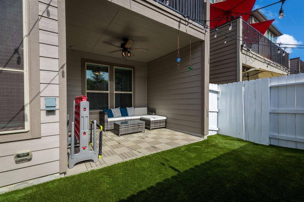 Covered tiled patio just off first floor living and bedroom area.  One of three outdoor living spaces.