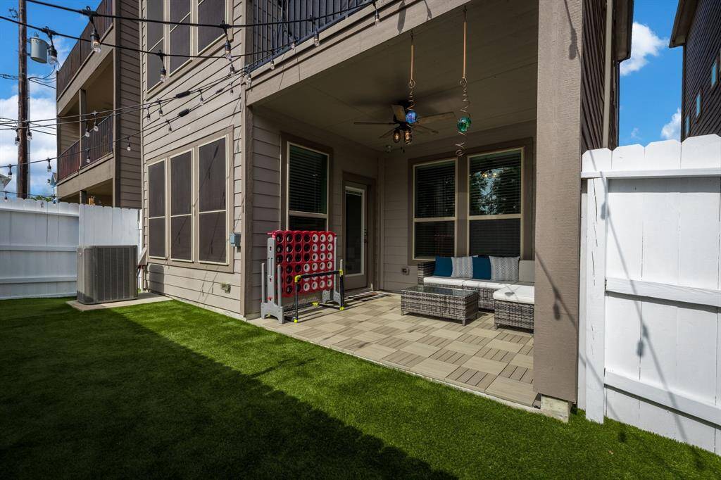 Wow what a great yard and low maintenance!  Has artificial turf.