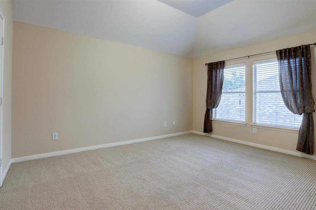 High ceilings in the second bedroom.