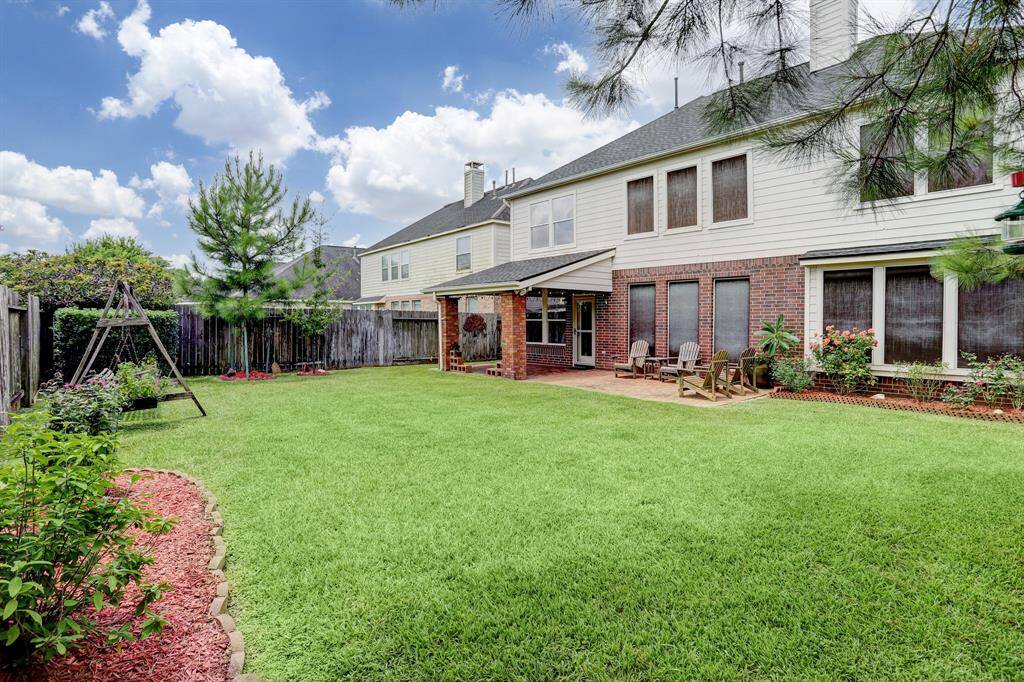 The yard provides plenty of room for outdoor living.