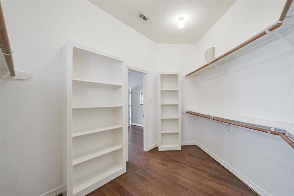 Primary closet has room for half of Macy's.