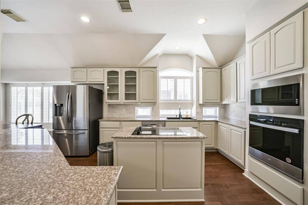 Huge kitchen with tons of cabinets.