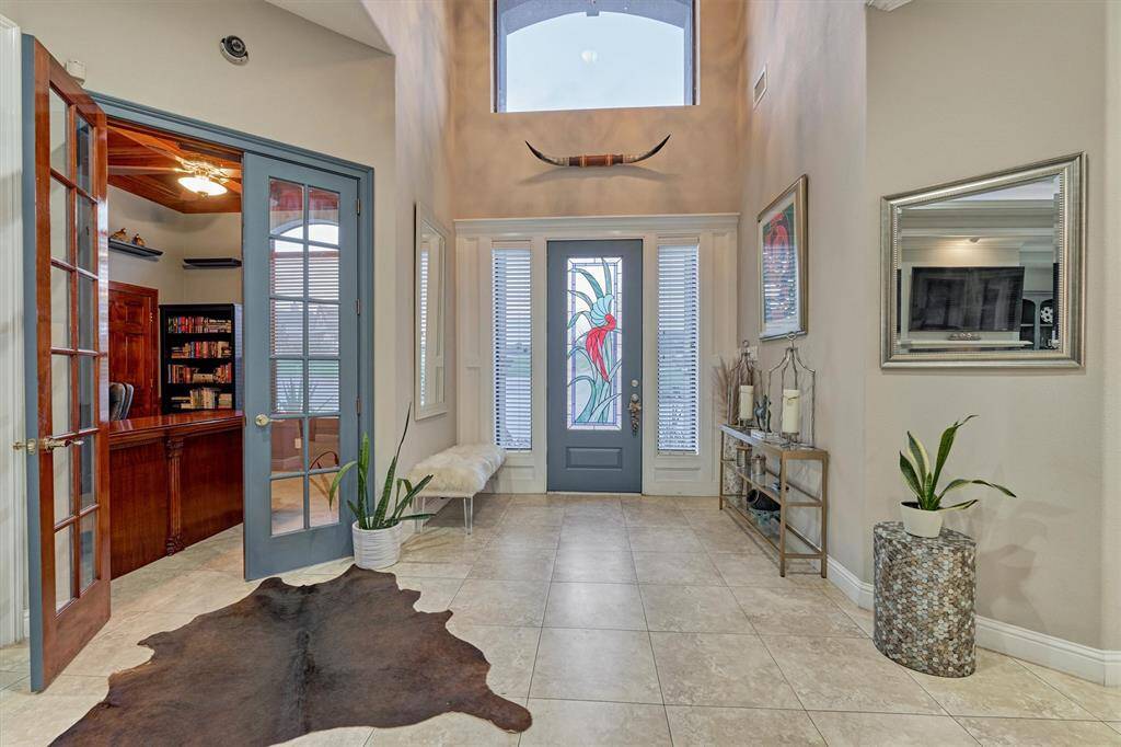 The study is located off the entryway.