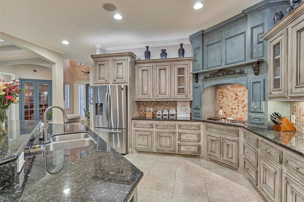The kitchen and dining area are spacious enough to provide space for many, yet the proximity and flow fosters intimate gatherings.