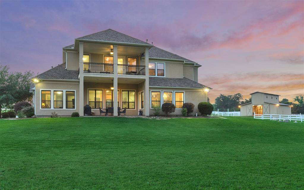 The home sits on almost 6 acres and has its own private horse barn just steps from your back door.