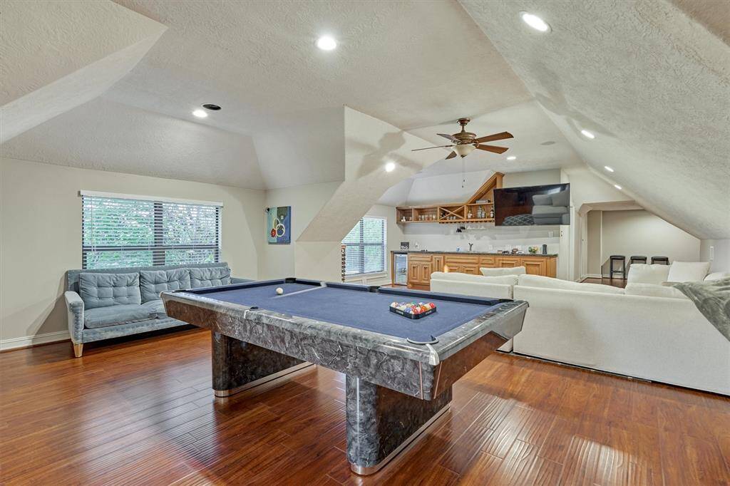 So many possibilities within this space!  The kitchenette houses a mini fridge, cooktop, and sink.