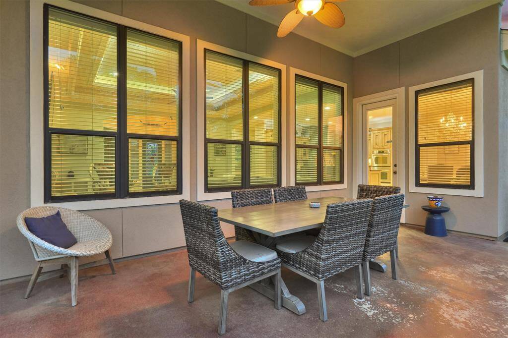 The covered back patio is a great place to relax and unwind!