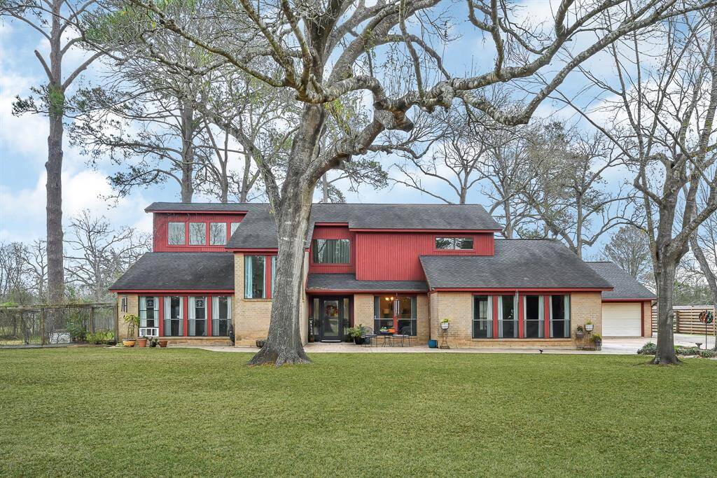 Welcome Home to 25102 Tenn Oaks located at the end of the cul-de-sac on 1.48 acres.