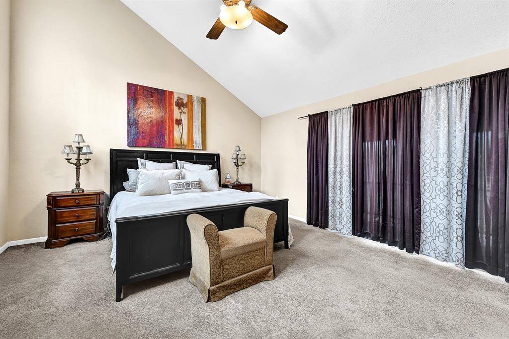Primary Suite located on the Second Floor with Balcony over looking Pool