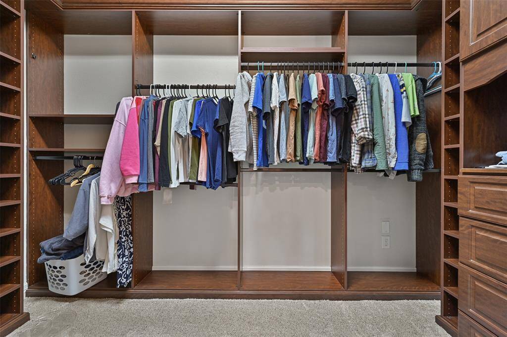 WOW! This custom closet is amazing! As you can see in the picture, lots of hanging space as well as shelves.  You have to visit this home see this closet