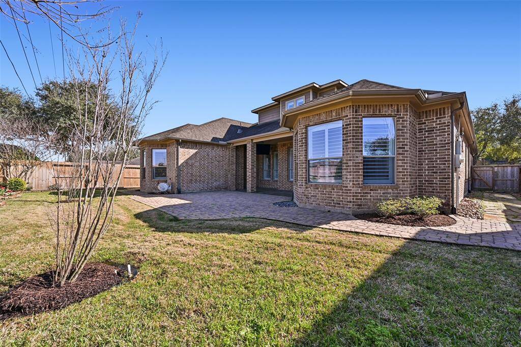 The covered back patio is an entertainers dream