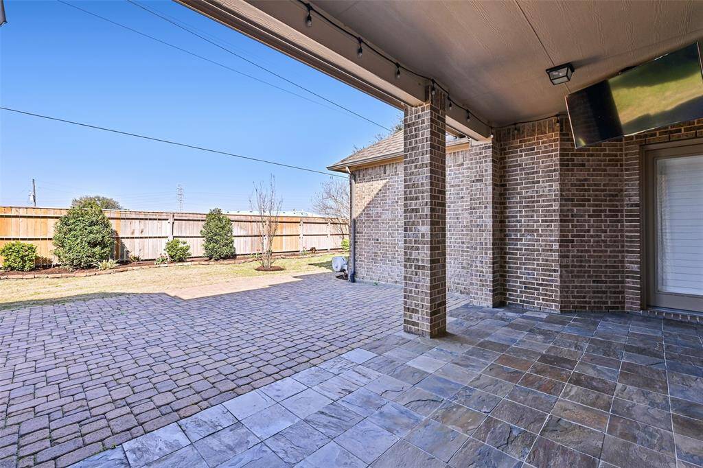 The covered patio also has a mounted TV
