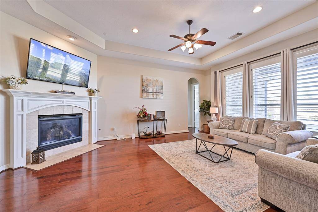 The Living Room is Huge! Also featuring hardwood flooring, fireplace, lots of natural light