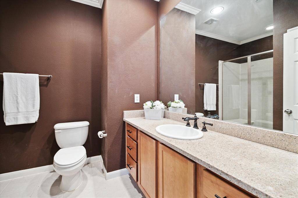 Primary Bath with Large Walk in Shower with Seat.