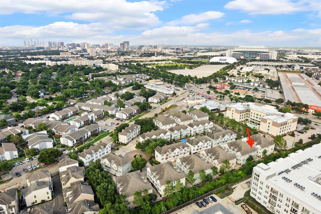 Where the arrow is is where the townhome is!!! See how close this is to the NRG Stadium, the Medical Center and Downtown Houston!!! And where the blue little triangle is is where the Pool, Huge Workout Room, Cabana, etc is.