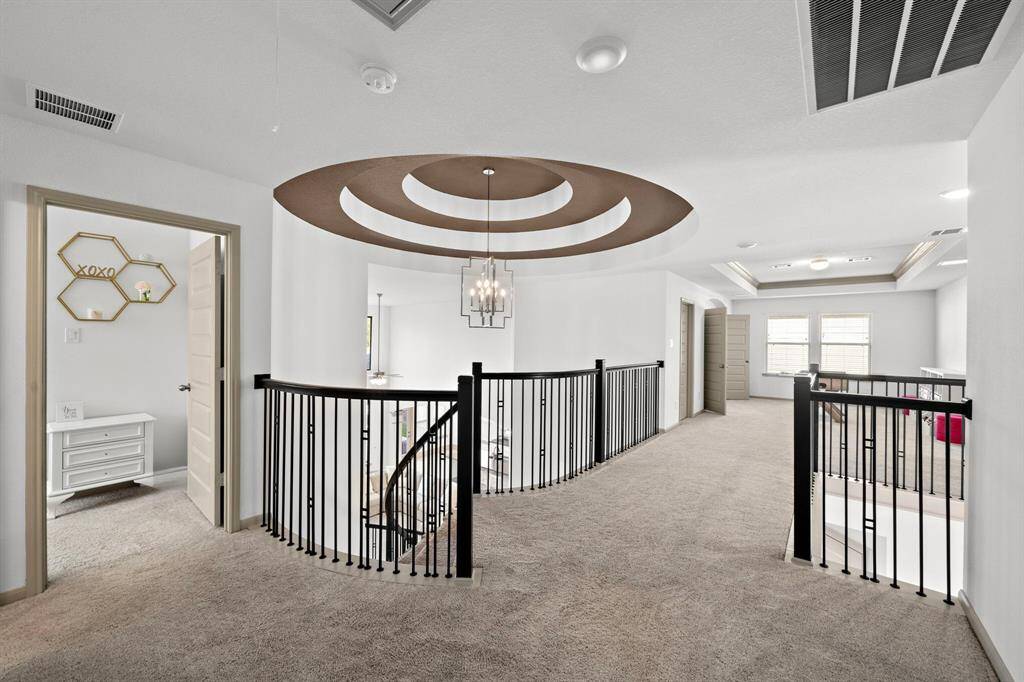 Masterfully crafted, the open-concept layout showcases the seamless flow between the entertainment spaces—ideal for large and intimate gatherings alike!