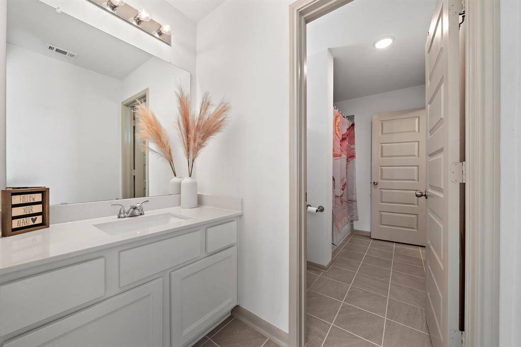 Easily customize this secondary bedroom with a walk-in into a sitting area, a home gym, or any functional space that suits your needs.