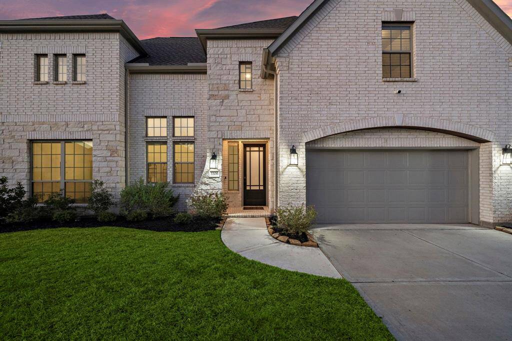 This stunning backyard showcases the home’s thoughtful design, seamlessly blending indoor comfort with outdoor serenity, perfect for creating cherished memories.