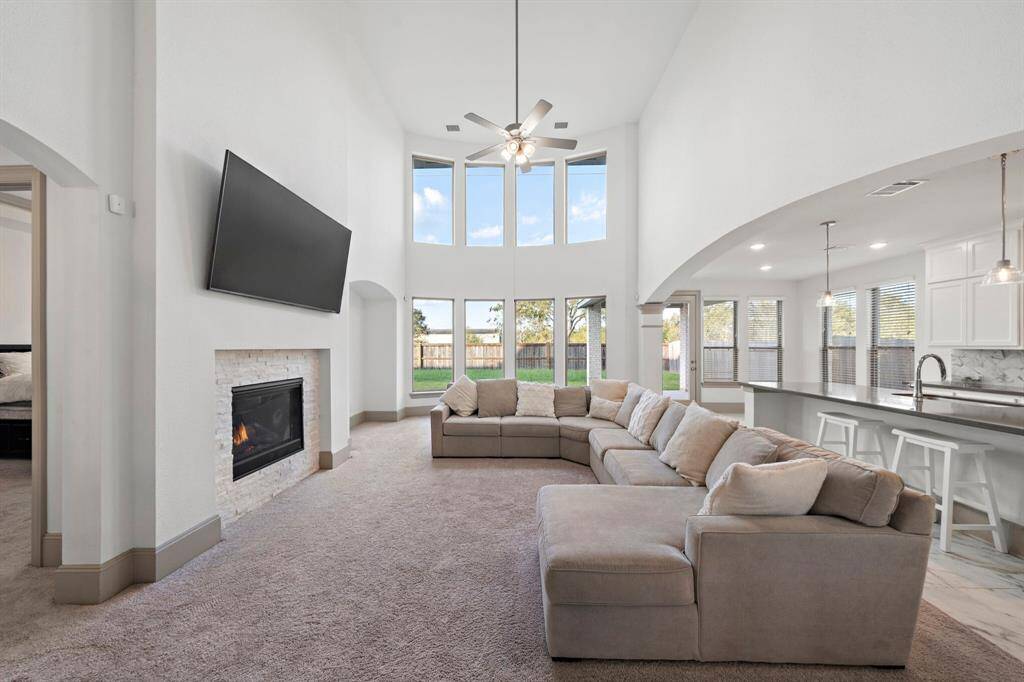 Just off the entryway, this dining room is designed for both functionality and style, offering plenty of room to host gatherings or enjoy everyday meals.