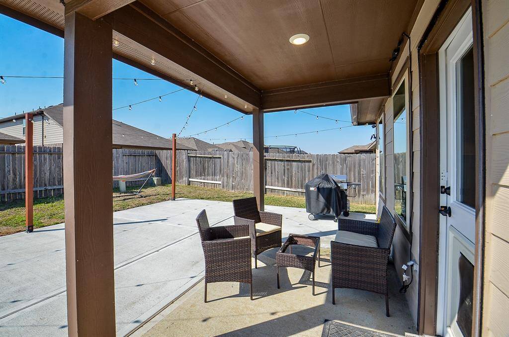 Expansive backyard with plenty of space for outdoor activities, gardening, or future upgrades.