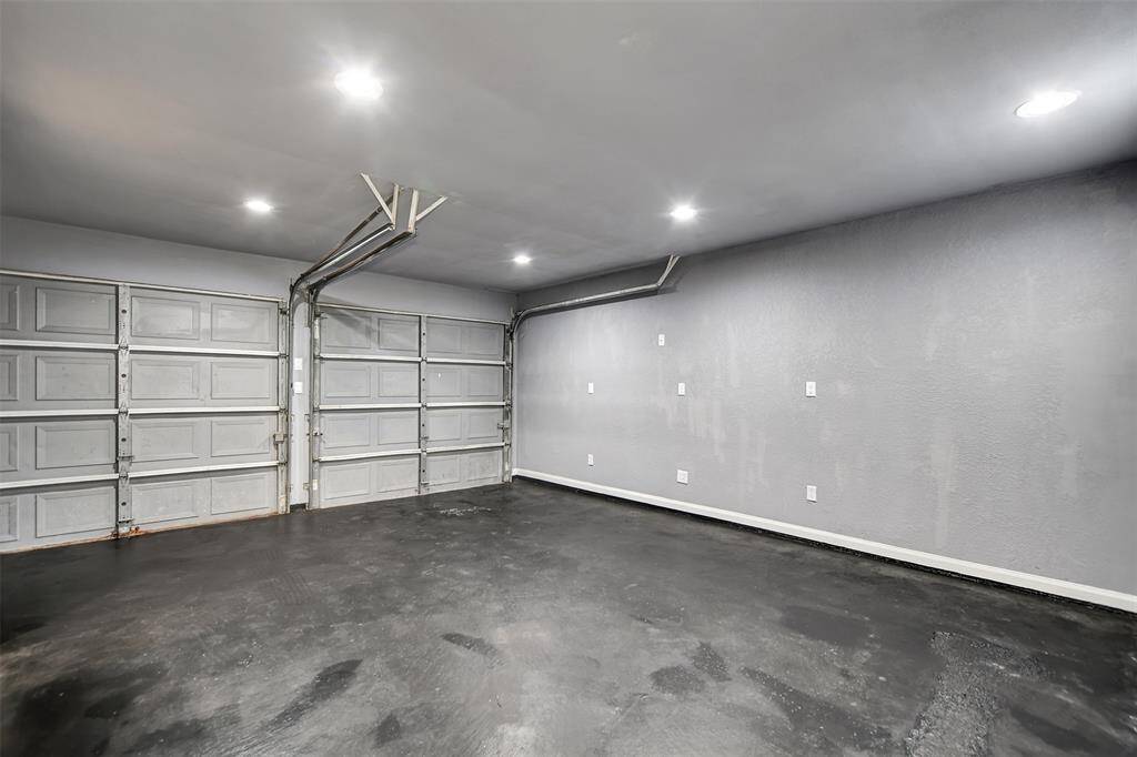 Two car garage or tun into a game room or use it for a 4th bedroom