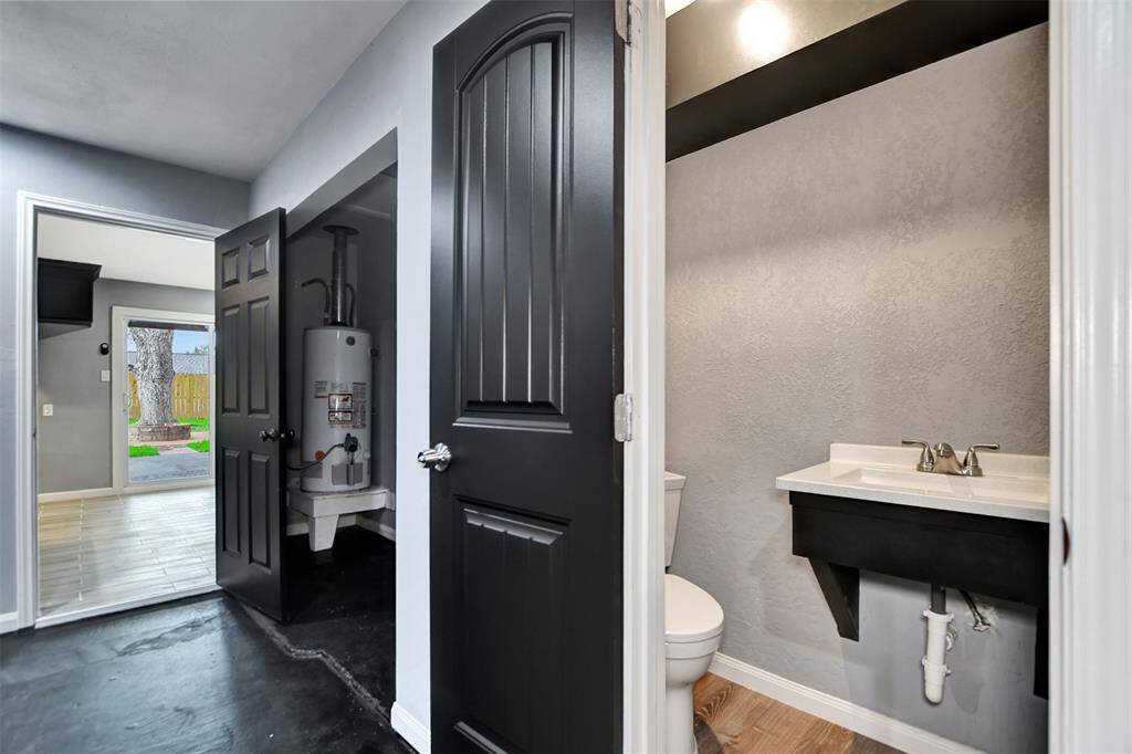 1/2 bath located in the two car garage.