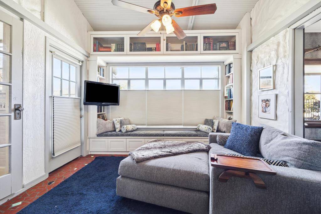 The sunporch which has been converted into a library and sitting room