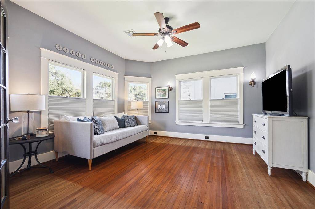 Pictured here is the front bedroom which has French doors that open to the living room. This adds flexibility to the space allowing for creative uses, if desired.