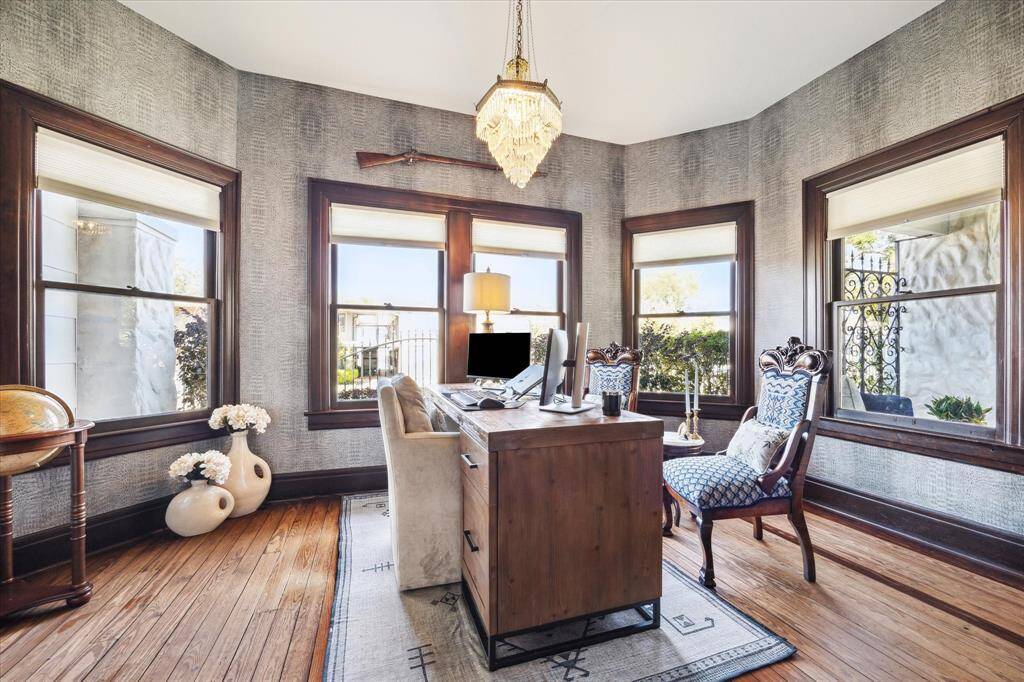 Formal sitting room has been converted into an office off the main entrance and overlooks both Marshall Street and Audubon Place.