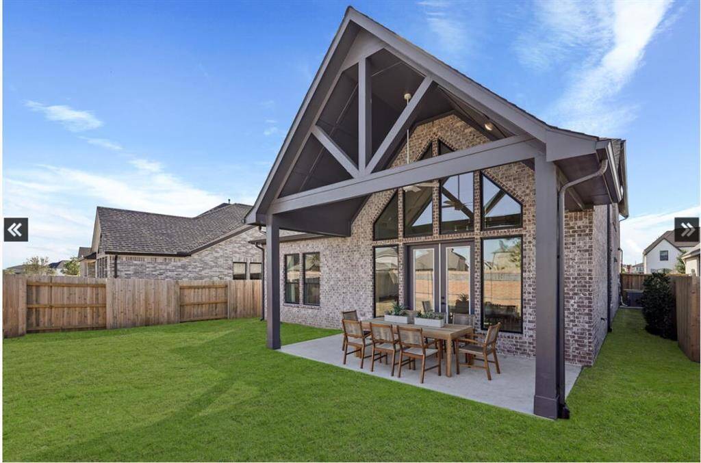*Representative PhotoBringing the outside inside with the wall of back windows.