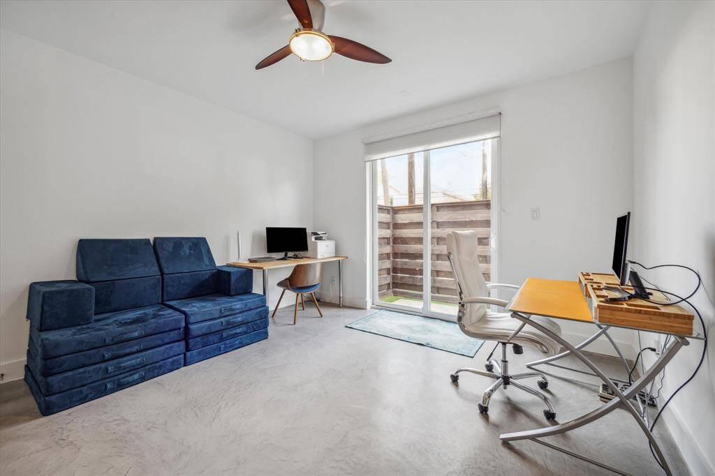 First floor guest bedroom, with access to side yard.