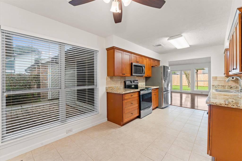 The breakfast room is perfect for casual meals. You will love the seller updates including the updated windows.