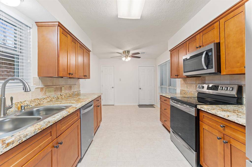 Stainless appliances offer a sleek and sophisticated look.
