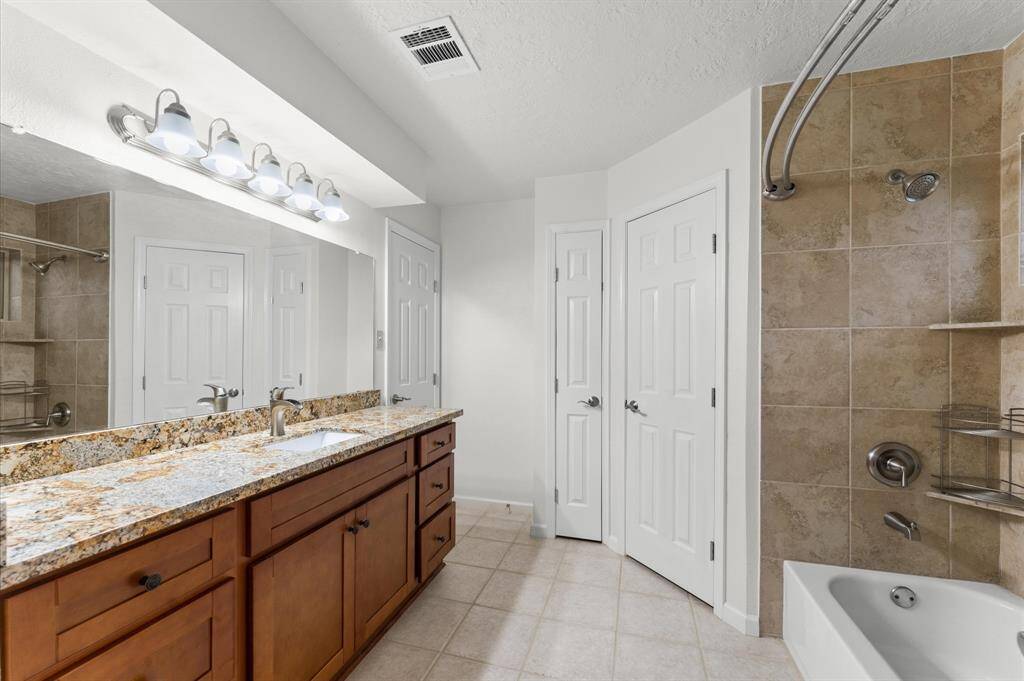 The large vanity area is perfect for getting ready during the morning rush hour.