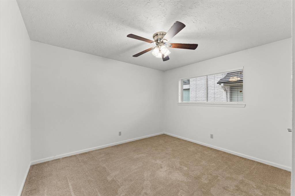 Second bedroom is perfect for guests or family.