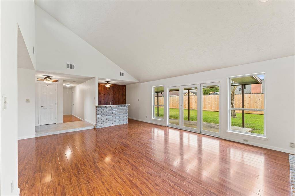 This large family room is ready for your Texas size furniture.