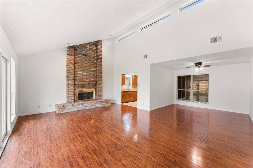 This fireplace with gas is a beautiful focal point to the family room.