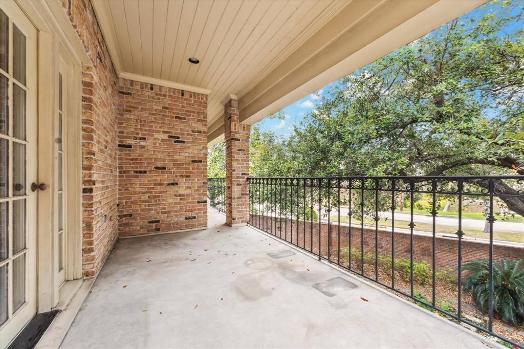 Note the depth of this balcony overlooking the backyard, which is accessed from the secondary bedroom.