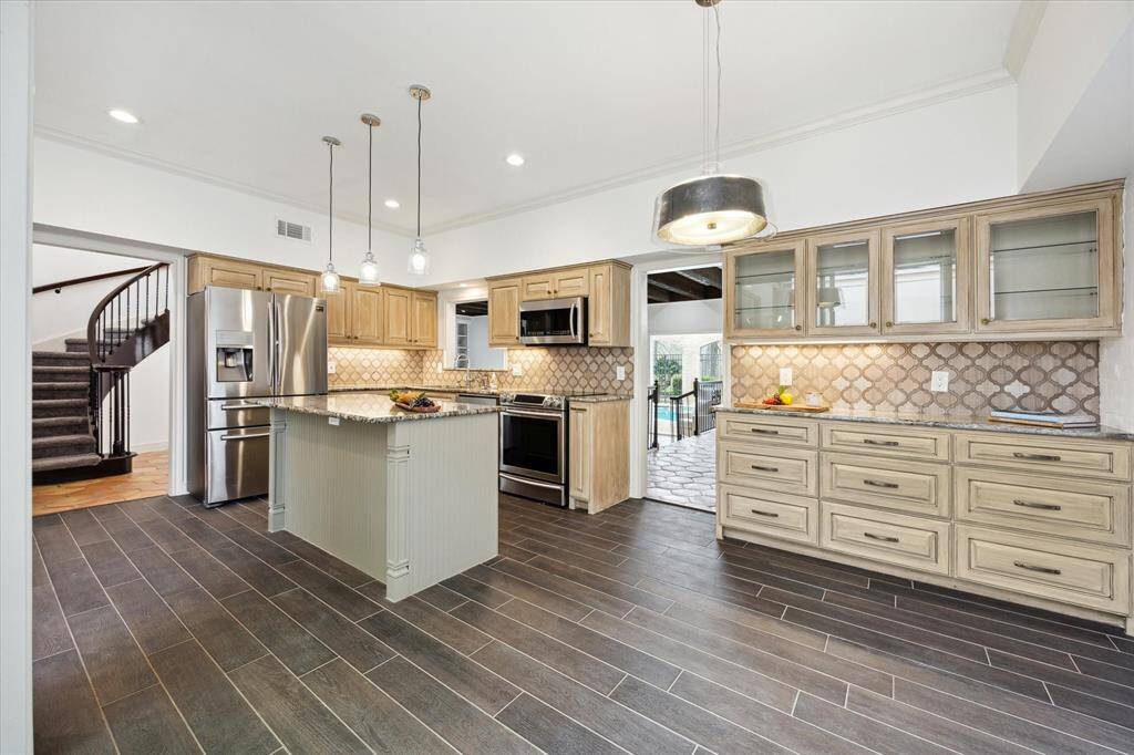 Expansive kitchen with ample space for casual dining.