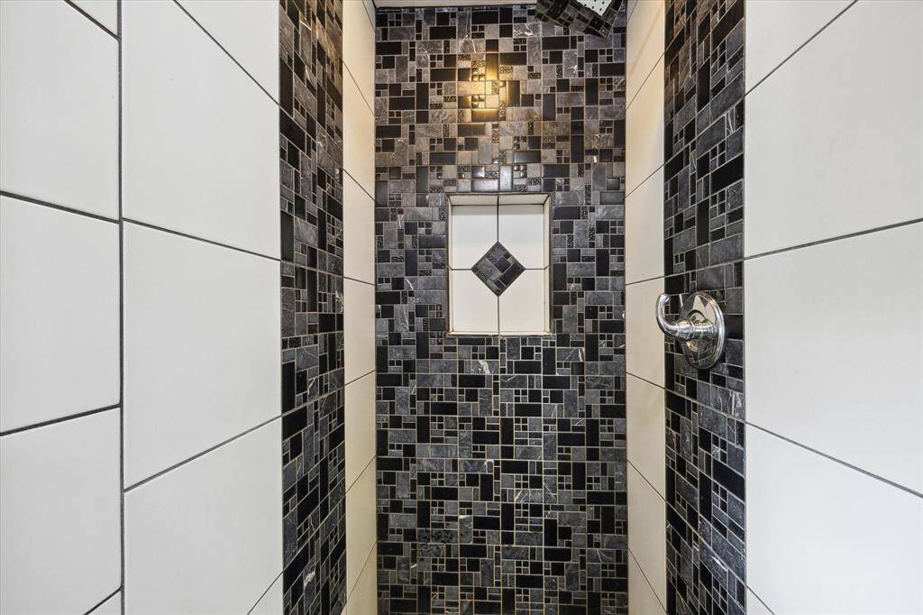 Indulge in a spa-like experience with the luxurious oversized shower head.