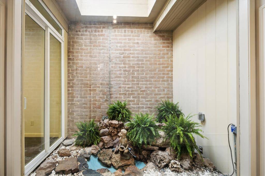 Experience tranquility in the enclosed atrium with soothing water features, located just off the entrance.