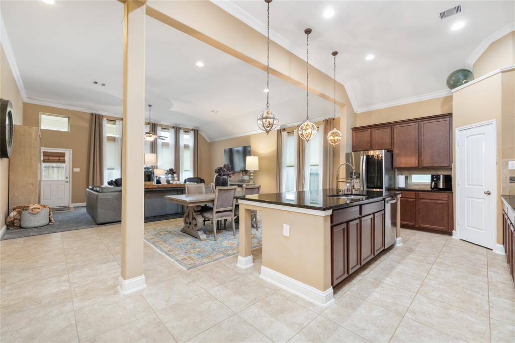 The open concept floorplan is great for socializing while working in the kitchen