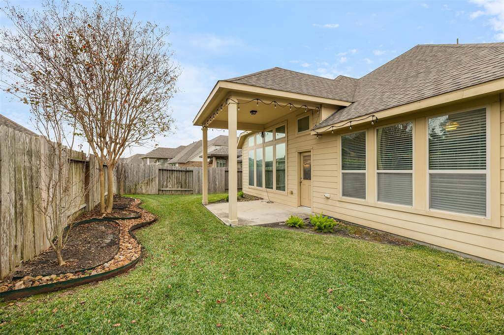 The well-landscaped yard is easy to maintain