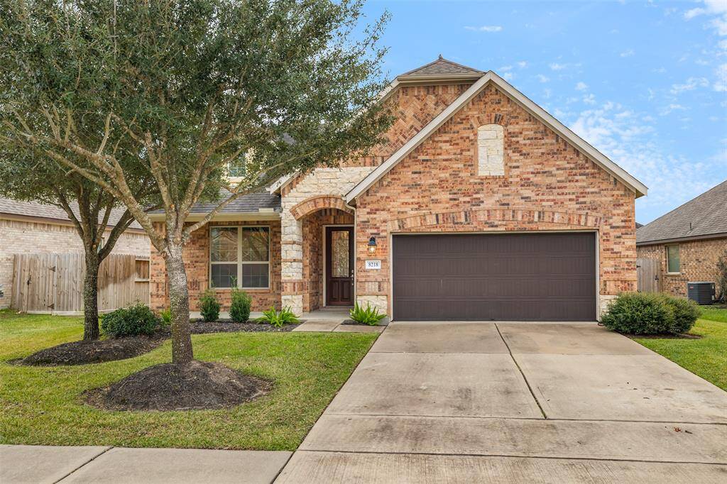 The brick and stone exterior has great curb appeal