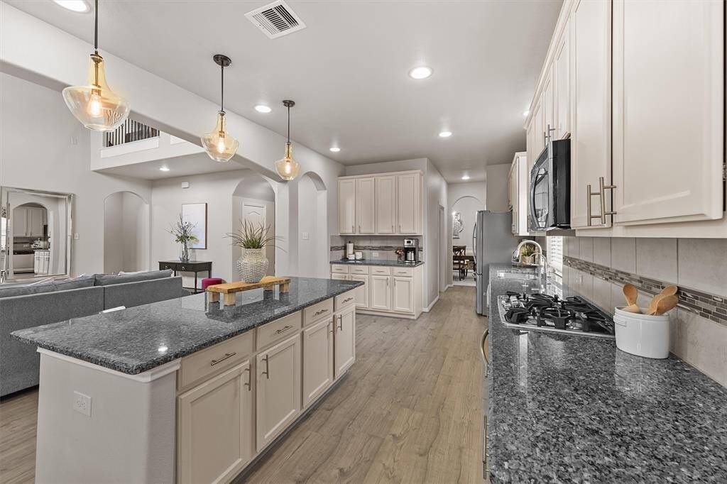 THIS IS THE ONE! This room is only one of many amazing spaces in this home!