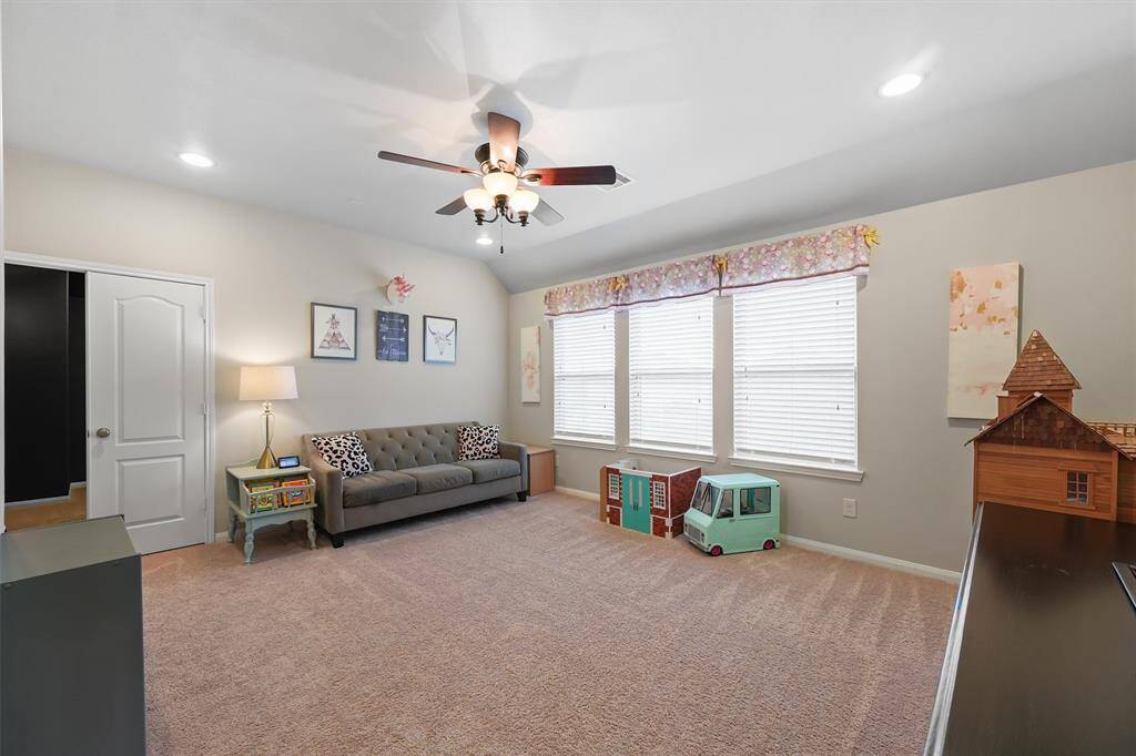 Head upstairs to the game room, the perfect space for family night. Whether it's game time or simply relaxing together, this room offers endless opportunities for fun and quality time.